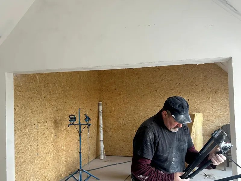 pleisteraar met machine