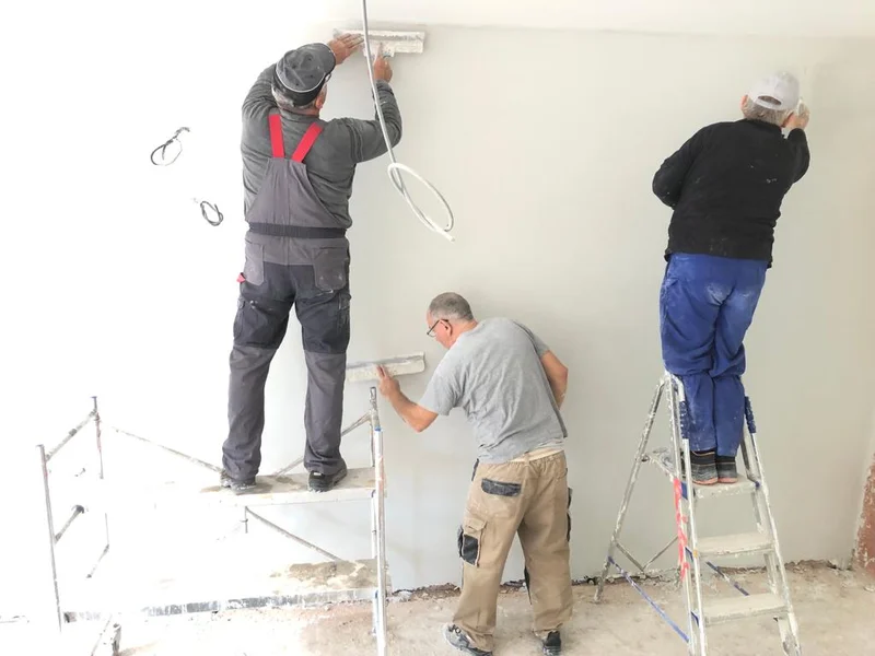 drie vaklui pleisteren de muur